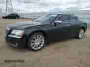 2013 Chrysler 300 C John Varvatos Limited Edition with VIN 2C3CCADT3DH621706, listed as a Copart auction lot 55780205 with 214,976 mi miles and Clean title. Bid and sale history available at DreamBid. Image 1.