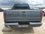 2000 Dodge 1500 z VIN 1B7HC13YXYJ173323, wystawiony jako Copart lot #69969774 z przebiegiem 425 918 mil mil oraz Szkoda całkowita • Salvage title. Historia ofert i sprzedaży dostępna na DreamBid. Obrazek 6.