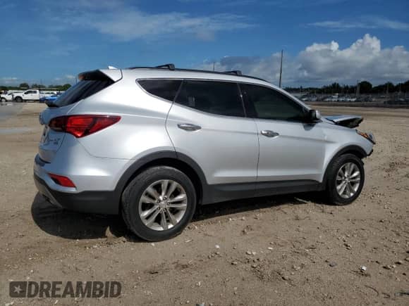 2018 Hyundai Santa Fe 2.0T с VIN 5XYZUDLA8JG508459, выставлен на аукционе Copart как лот 62694805 с пробегом 57 558 миль миль и Списание • Salvage title. История ставок и продаж доступна на DreamBid. Изображение 3.