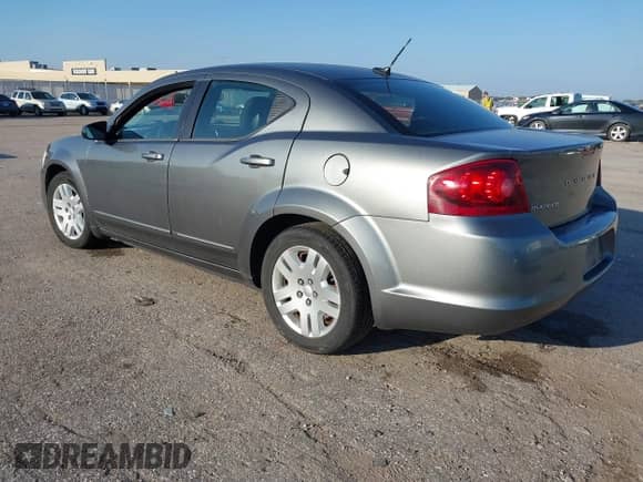 2013 Dodge Avenger SE with VIN 1C3CDZAB6DN590997, listed as a IAAI auction lot 43301503 with 176,151 mi miles and . Bid and sale history available at DreamBid. Image 3.