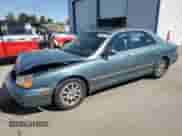 2002 Hyundai XG L z VIN KMHFU45E12A225689, wystawiony jako Copart lot #73006754 z przebiegiem 182 430 mil mil oraz Szkoda całkowita • Salvage title. Historia ofert i sprzedaży dostępna na DreamBid. Obrazek 1.