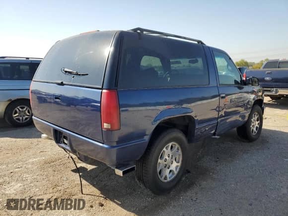 1998 Chevrolet Tahoe с VIN 3GNEK18R5WG107730, выставлен на аукционе Copart как лот 74563524 с пробегом 251 307 миль миль и Списание • Salvage title. История ставок и продаж доступна на DreamBid. Изображение 3.