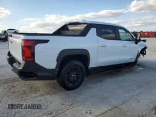 2024 Chevrolet Silverado EV Work Truck z VIN 1GC10VEL1RU200511, wystawiony jako Copart lot #85029964 z przebiegiem Nie podano mil oraz Czysty tytuł • Clean title. Historia ofert i sprzedaży dostępna na DreamBid. Obrazek 3.
