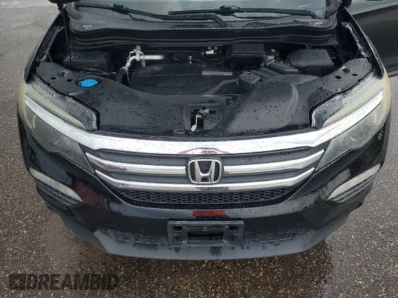 2017 Honda Pilot EX-L z VIN 5FNYF6H71HB067418, wystawiony jako Copart lot #81697595 z przebiegiem 130 461 mil mil oraz Szkoda całkowita • Salvage title. Historia ofert i sprzedaży dostępna na DreamBid. Obrazek 12.