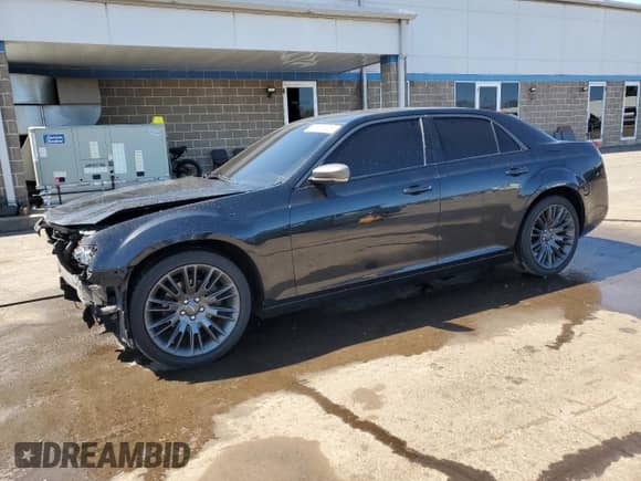 2013 Chrysler 300 C John Varvatos Limited Edition with VIN 2C3CCADG1DH709978, listed as a Copart auction lot 52357505 with 140,164 mi miles and Salvage title. Bid and sale history available at DreamBid. Image 1.