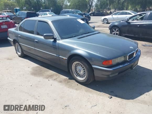 2000 BMW 7 Series 740iL z VIN WBAGH8348YDP14383, wystawiony jako IAAI lot #42623041 z przebiegiem 176 801 mil mil oraz . Historia ofert i sprzedaży dostępna na DreamBid. Obrazek 1.