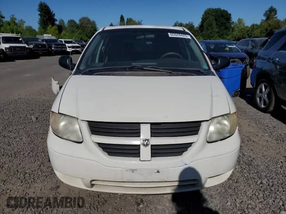 2005 Dodge Caravan SXT with VIN 1D4GP45R15B394101, listed as a Copart auction lot 65929425 with 216,391 mi miles and Salvage title. Bid and sale history available at DreamBid. Image 5.
