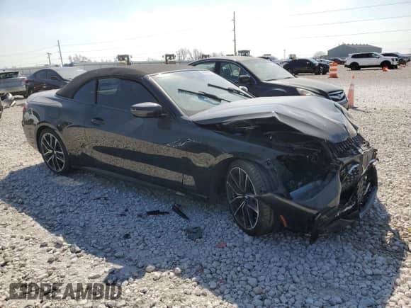 2022 BMW 4 Series 430i with VIN WBA23AT03NCH74847, listed as a Copart auction lot 48988925 with 14,622 mi miles and Salvage title. Bid and sale history available at DreamBid. Image 4.