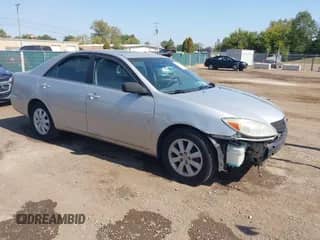 2004 Toyota Camry LE with VIN 4T1BF30K24U585278, listed as a IAAI auction lot 43235431 with 244,379 mi miles and . Bid and sale history available at DreamBid. Image 1.