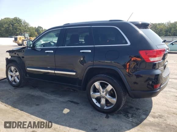 2013 Jeep Grand Cherokee Limited with VIN 1C4RJFBG5DC633776, listed as a Copart auction lot 80206735 with 170,991 mi miles and Salvage title. Bid and sale history available at DreamBid. Image 2.