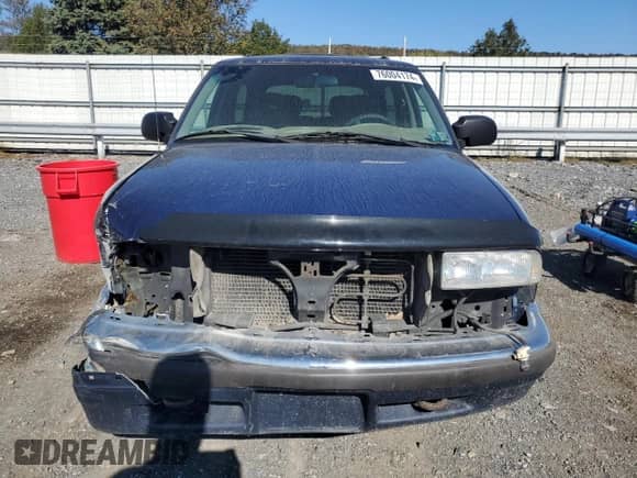 2001 Chevrolet Blazer LS z VIN 1GNCT18W21K182784, wystawiony jako Copart lot #76004174 z przebiegiem 153 833 mil mil oraz Szkoda całkowita • Salvage title. Historia ofert i sprzedaży dostępna na DreamBid. Obrazek 5.
