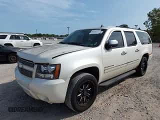 2011 Chevrolet Suburban LTZ with VIN 1GNSKKE30BR293390, listed as a IAAI auction lot 43187743 with 119,974 mi miles and . Bid and sale history available at DreamBid. Image 2.