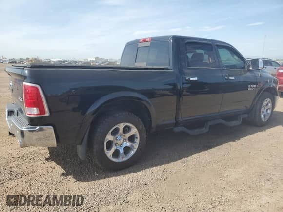 2014 Ram 1500 Laramie z VIN 1C6RR7VM8ES434901, wystawiony jako Copart lot #65967775 z przebiegiem 111 433 mil mil oraz Czysty tytuł • Clean title. Historia ofert i sprzedaży dostępna na DreamBid. Obrazek 3.
