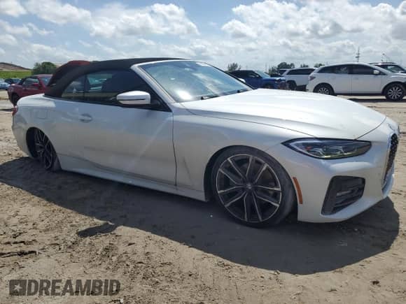 2023 BMW 4 Series 430i with VIN WBA23AT03PCL56790, listed as a Copart auction lot 55554825 with 9,747 mi miles and Salvage title. Bid and sale history available at DreamBid. Image 4.