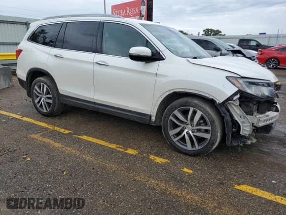 2016 Honda Pilot Elite z VIN 5FNYF6H09GB101946, wystawiony jako Copart lot #81209865 z przebiegiem 186 488 mil mil oraz Szkoda całkowita • Salvage title. Historia ofert i sprzedaży dostępna na DreamBid. Obrazek 4.