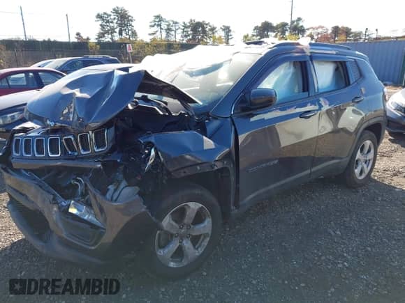 2021 Jeep Compass Latitude with VIN 3C4NJDBB8MT537958, listed as a IAAI auction lot 40705924 with 73,319 mi miles and . Bid and sale history available at DreamBid. Image 23.
