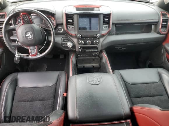 2019 Ram 1500 Rebel z VIN 1C6SRFET4KN831051, wystawiony jako Copart lot #61135505 z przebiegiem 77 330 mil mil oraz Szkoda całkowita • Salvage title. Historia ofert i sprzedaży dostępna na DreamBid. Obrazek 8.