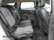 2018 Ford Escape SE z VIN 1FMCU9GD1JUC27881, wystawiony jako Copart lot #66502025 z przebiegiem 86 097 mil mil oraz Szkoda całkowita • Salvage title. Historia ofert i sprzedaży dostępna na DreamBid. Obrazek 11.