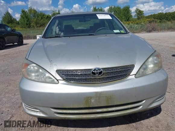 2003 Toyota Camry LE with VIN 4T1BE32K33U165706, listed as a IAAI auction lot 43134674 with 258,478 mi miles and . Bid and sale history available at DreamBid. Image 6.