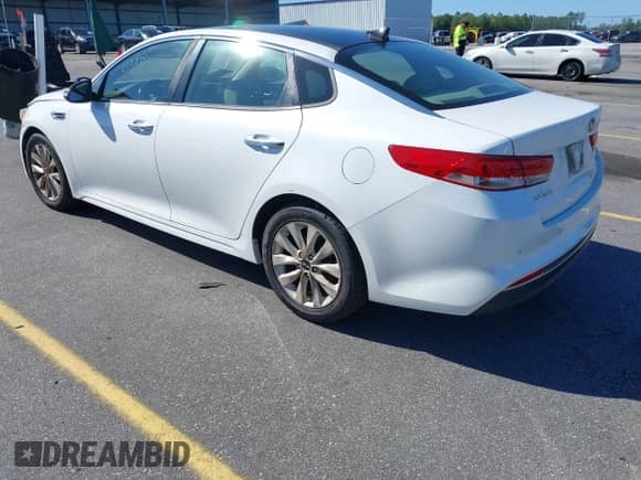 2016 Kia Optima EX with VIN 5XXGU4L36GG103920, listed as a IAAI auction lot 43380555 with 114,062 mi miles and . Bid and sale history available at DreamBid. Image 3.