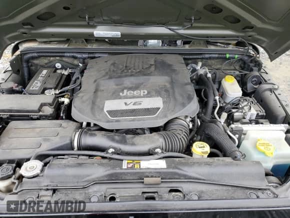 2016 Jeep Wrangler Willys Wheeler z VIN 1C4AJWAG8GL118032, wystawiony jako Copart lot #69217005 z przebiegiem 26 745 mil mil oraz Szkoda całkowita • Salvage title. Historia ofert i sprzedaży dostępna na DreamBid. Obrazek 11.