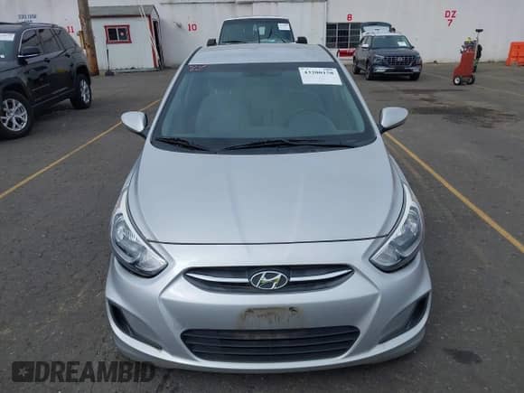 2016 Hyundai Accent SE z VIN KMHCT4AE1GU090523, wystawiony jako IAAI lot #43200158 z przebiegiem 56 415 mil mil oraz . Historia ofert i sprzedaży dostępna na DreamBid. Obrazek 13.