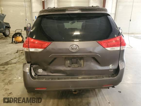 2012 Toyota Sienna LE AAS with VIN 5TDKK3DC8CS256316, listed as a Copart auction lot 66836725 with 238,189 mi miles and Salvage title. Bid and sale history available at DreamBid. Image 6.
