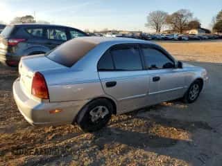 2003 Hyundai Accent GL с VIN KMHCG45C93U496038, выставлен на аукционе Copart как лот 87260904 с пробегом 104 251 миль миль и Списание • Salvage title. История ставок и продаж доступна на DreamBid. Изображение 3.