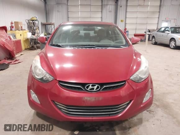 2013 Hyundai Elantra GLS z VIN KMHDH4AE2DU515264, wystawiony jako IAAI lot #41212787 z przebiegiem 154 840 mil mil oraz . Historia ofert i sprzedaży dostępna na DreamBid. Obrazek 6.