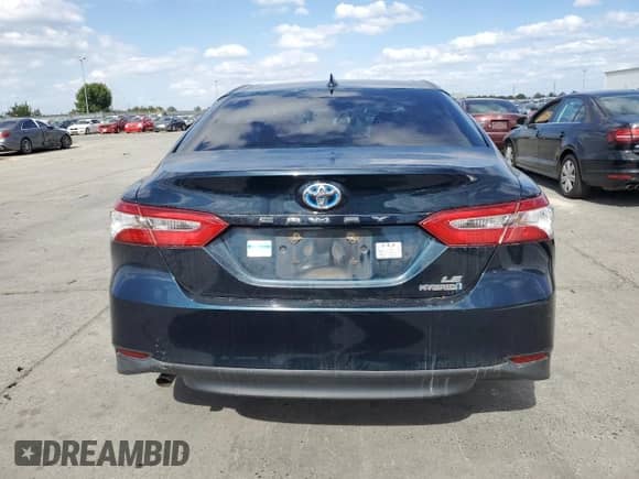 2019 Toyota Camry Hybrid LE с VIN 4T1B31HK4KU516221, выставлен на аукционе Copart как лот 86147575 с пробегом 357 869 миль миль и Чистый • Clean title. История ставок и продаж доступна на DreamBid. Изображение 6.