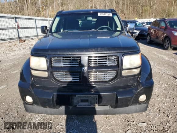 2011 Dodge Nitro SXT z VIN 1D4PU5GK5BW575754, wystawiony jako Copart lot #79841234 z przebiegiem 246 589 mil mil oraz Szkoda całkowita • Salvage title. Historia ofert i sprzedaży dostępna na DreamBid. Obrazek 5.