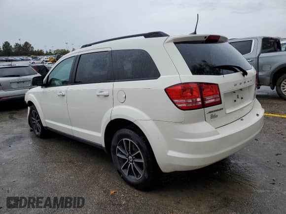 2018 Dodge Journey SE with VIN 3C4PDCAB8JT520231, listed as a Copart auction lot 72542694 with 96,199 mi miles and Salvage title. Bid and sale history available at DreamBid. Image 2.