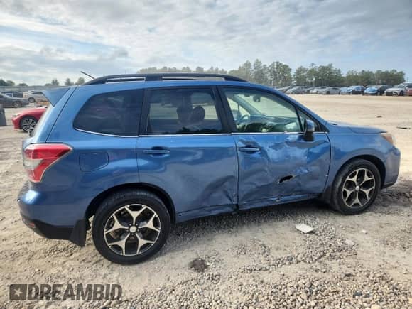 2015 Subaru Forester XT Touring with VIN JF2SJGWC3FH511522, listed as a Copart auction lot 82362975 with 132,782 mi miles and Salvage title. Bid and sale history available at DreamBid. Image 3.