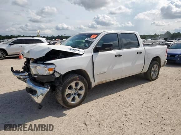 2023 Ram 1500 Lone Star with VIN 1C6SRFFT1PN692860, listed as a Copart auction lot 67404305 with 57,407 mi miles and Salvage title. Bid and sale history available at DreamBid. Image 1.