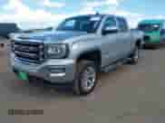 2018 GMC Sierra 1500 SLT z VIN 3GTU2NEC2JG556450, wystawiony jako IAAI lot #42597145 z przebiegiem 122 940 mil mil oraz . Historia ofert i sprzedaży dostępna na DreamBid. Obrazek 2.