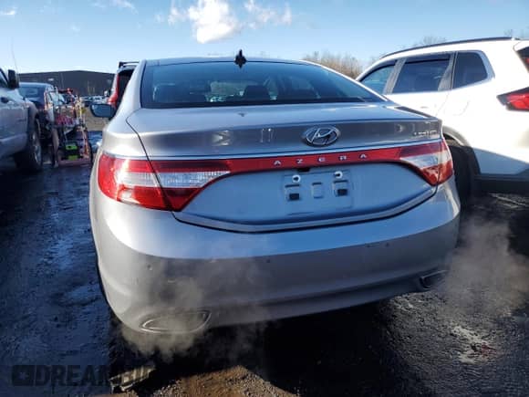 2014 Hyundai Azera Limited с VIN KMHFH4JG5EA421179, выставлен на аукционе Copart как лот 84185634 с пробегом 82 350 миль миль и Списание • Salvage title. История ставок и продаж доступна на DreamBid. Изображение 6.