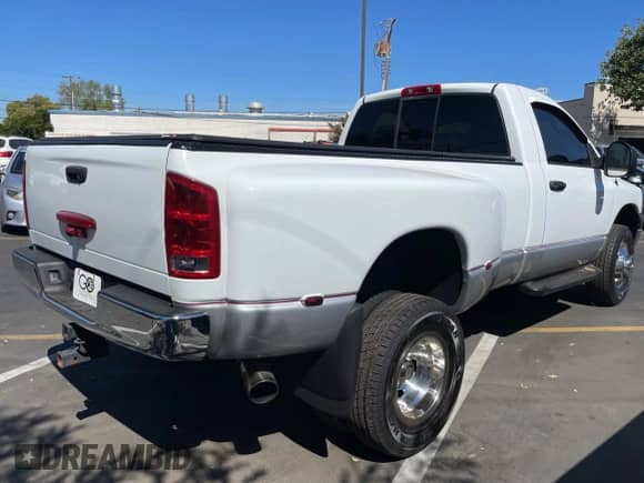 2006 Dodge RAM with VIN 3D7MX46C76G204357, listed as a Copart auction lot 73567364 with 106,166 mi miles and Salvage title. Bid and sale history available at DreamBid. Image 4.