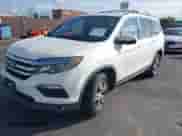 2018 Honda Pilot EX-L with VIN 5FNYF5H5XJB033220, listed as a IAAI auction lot 43205648 with 117,623 mi miles and . Bid and sale history available at DreamBid. Image 18.