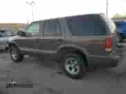 2000 Chevrolet Blazer LS z VIN 1GNCS13W7YK218263, wystawiony jako Copart lot #80774144 z przebiegiem 76 764 mil mil oraz Szkoda całkowita • Salvage title. Historia ofert i sprzedaży dostępna na DreamBid. Obrazek 2.