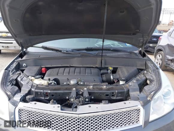 2009 Chevrolet Traverse LTZ z VIN 1GNER33D89S102490, wystawiony jako IAAI lot #42352412 z przebiegiem 56 763 mil mil oraz . Historia ofert i sprzedaży dostępna na DreamBid. Obrazek 10.