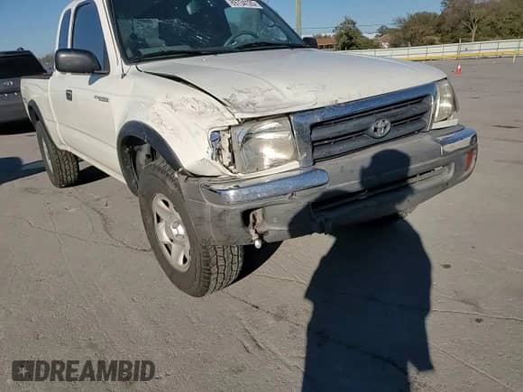 1998 Toyota Tacoma with VIN 4TASM92N1WZ175674, listed as a Copart auction lot 89734125 with 214,966 mi miles and Salvage title. Bid and sale history available at DreamBid. Image 13.