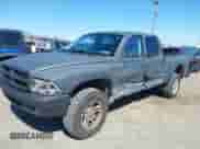 2004 Dodge Dakota Sport z VIN 1D7HG38K84S608161, wystawiony jako IAAI lot #41863394 z przebiegiem 145 288 mil mil oraz . Historia ofert i sprzedaży dostępna na DreamBid. Obrazek 6.
