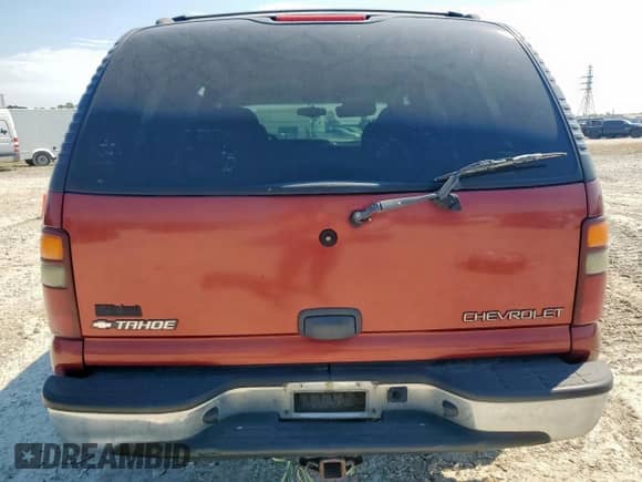 2002 Chevrolet Tahoe LS с VIN 1GNEC13Z22R159198, выставлен на аукционе Copart как лот 81884745 с пробегом 158 489 миль миль и Списание • Salvage title. История ставок и продаж доступна на DreamBid. Изображение 6.