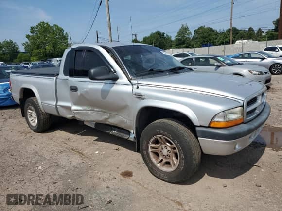 2001 Dodge Dakota Sport с VIN 1B7GG22N01S152414, выставлен на аукционе Copart как лот 66342335 с пробегом 147 060 миль миль и Списание • Salvage title. История ставок и продаж доступна на DreamBid. Изображение 4.