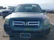 2006 Honda Pilot EX-L with VIN 5FNYF28796B026606, listed as a IAAI auction lot 41612560 with 224,577 mi miles and . Bid and sale history available at DreamBid. Image 6.