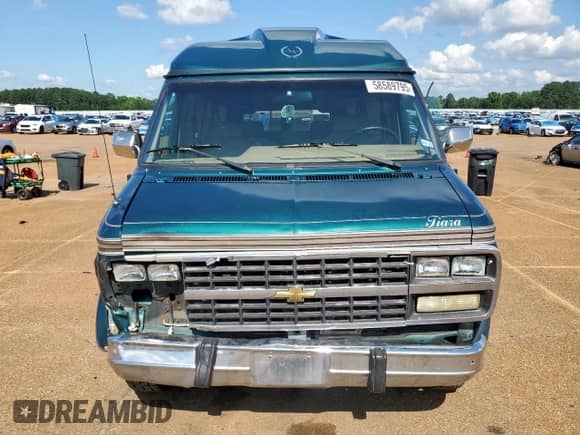 1995 Chevrolet Chevy Van с VIN 1GBEG25K9SF141922, выставлен на аукционе Copart как лот 58589795 с пробегом 77 242 миль миль и Списание • Salvage title. История ставок и продаж доступна на DreamBid. Изображение 5.