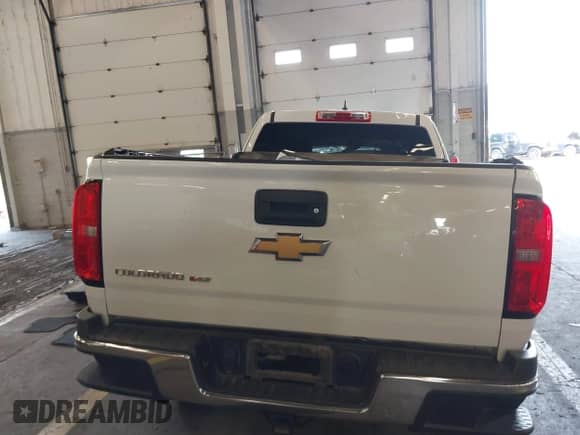 2019 Chevrolet Colorado 2WD Work Truck z VIN 1GCHSBEN7K1158829, wystawiony jako IAAI lot #40285519 z przebiegiem 71 550 mil mil oraz . Historia ofert i sprzedaży dostępna na DreamBid. Obrazek 16.