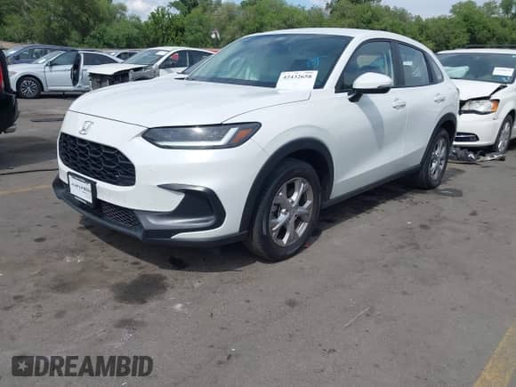 2023 Honda HR-V LX с VIN 3CZRZ2H30PM748501, выставлен на аукционе IAAI как лот 42432658 с пробегом 27 185 миль миль и . История ставок и продаж доступна на DreamBid. Изображение 2.