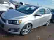 2013 Chevrolet Sonic LTZ with VIN 1G1JE5SH1D4166802, listed as a IAAI auction lot 41634168 with 86,351 mi miles and . Bid and sale history available at DreamBid. Image 2.
