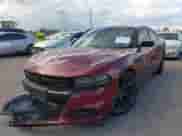 2019 Dodge Charger SXT with VIN 2C3CDXBG1KH732497, listed as a IAAI auction lot 43292960 with 127,248 mi miles and . Bid and sale history available at DreamBid. Image 2.